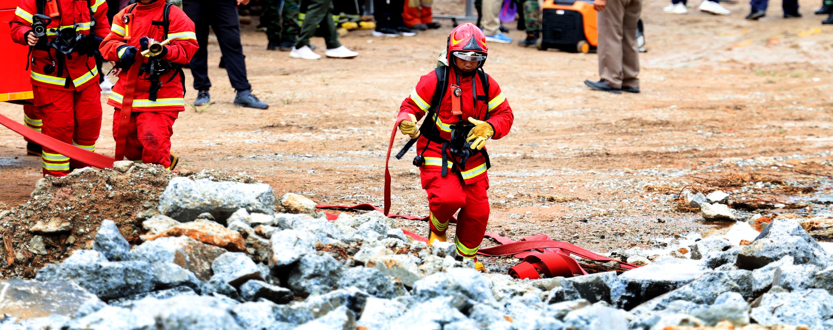 Firefighters conducting search and rescue operation.